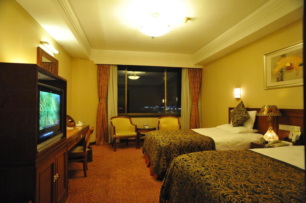 Golden Gulf Hotel Yantai Esterno foto